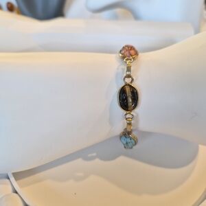 Elegant Gold and Multicolor Scarab Bracelet